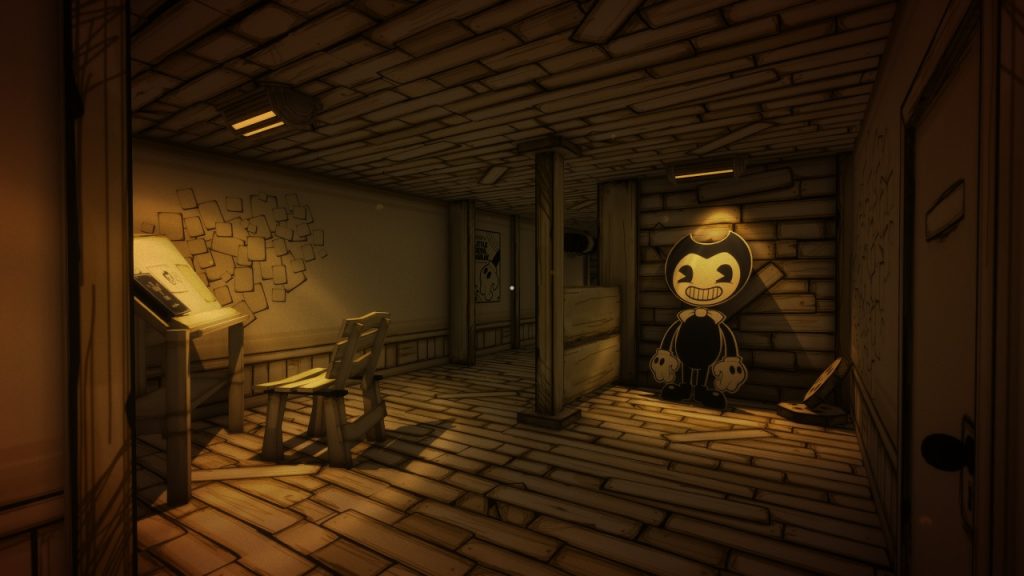 Standing in a corridor, a cardboard cutout of Bendy, the game's grinning evil character, leers at you, leaning against the wall.